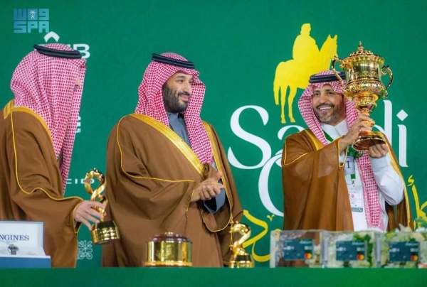 Crown Prince and Prime Minister Mohammed bin Salman presents Saudi Cup to the winners during the ceremony held at King Abdulaziz Racecourse in Riyadh on Saturday