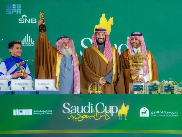 Crown Prince and Prime Minister Mohammed bin Salman presents Saudi Cup to the winners during the ceremony held at King Abdulaziz Racecourse in Riyadh on Saturday