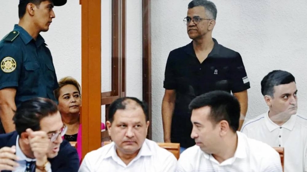 Defendants and lawyers at the start of the trial August 2023. — courtesy Reuters