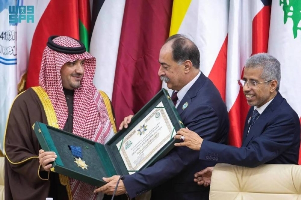 Saudi Minister of Interior Prince Abdulaziz bin Saud bin Naif receives Prince Naif Arab Security Medal of the Excellent Class for Custodian of the Two Holy Mosques King Salman in Tunis on Monday.