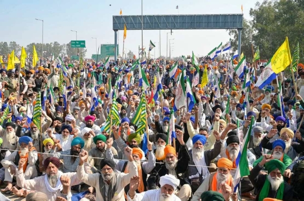 Farmers shout slogans during a protest to demand minimum crop prices, near the Haryana-Punjab state border at Shambhu in Patiala district about 200 kilometres north of New Delhi on February 16, 2024