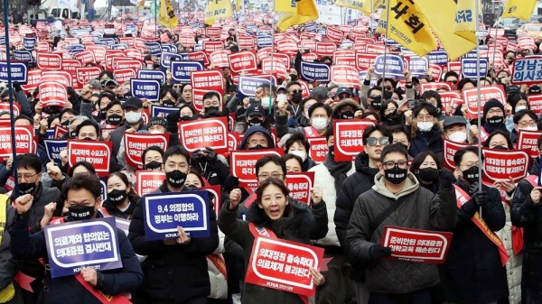 South Korean doctors participate in a rally against the government's medical policy on Sunday in Seoul, South Korea. — courtesy Chung Sung-Jun/Getty Images