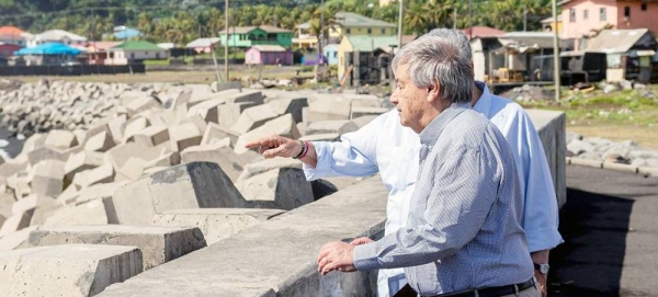 

UN Secretary-General António Guterres (foreground) and Ralph E. Gonsalves, prime minister of Saint Vincent and the Grenadines survey the sea defense project under way in Sandy Bay as part of the island nation's efforts to protect against sea-level rise. — courtesy UN Photo/Lucanus Ollivierre