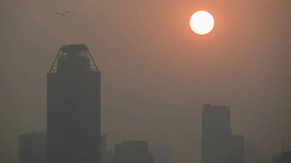 Air pollution turns the view of Bangkok's skyline into shadows