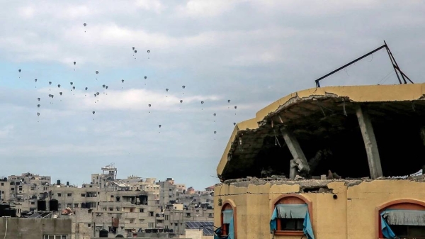 Aid parcels are airdropped over the northern Gaza Strip on Friday