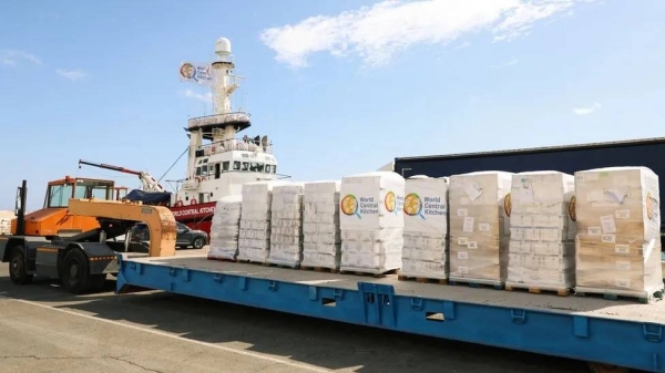 The ship is towing a barge loaded with dry and canned food for Gazans