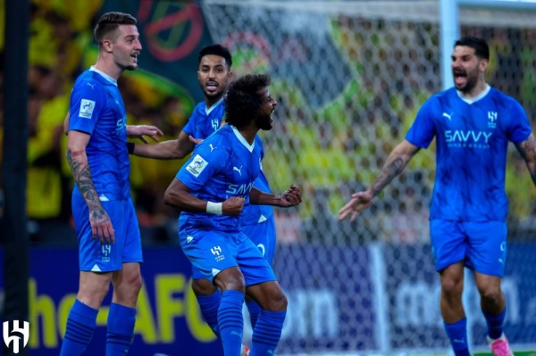 Yasser Al Shahrani celebrates his goal. 