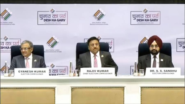 India’s Chief Election Commissioner, Rajiv Kumar, flanked by the two other election commissioners, announces the dates for the nationwide elections.