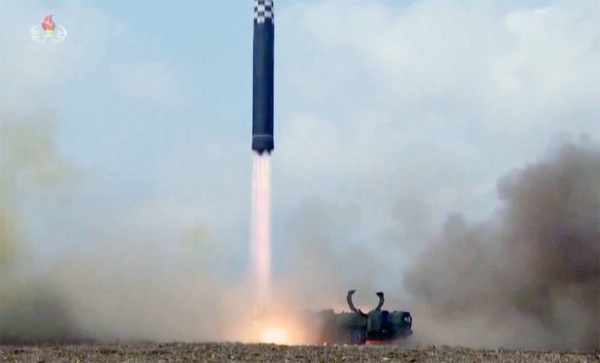 The screengrab shows North Korea firing multiple short-range ballistic missiles toward the East Sea (Sea of Japan) on Monday,