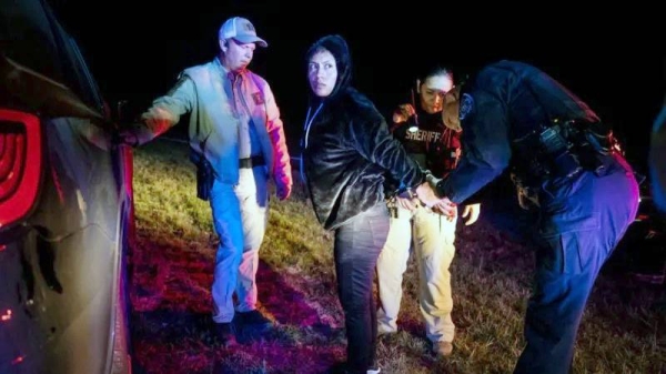 Migrant being arrested after car chase. SB4 gives police officers in Texas broad powers to arrest migrants. — courtesy Getty Images
