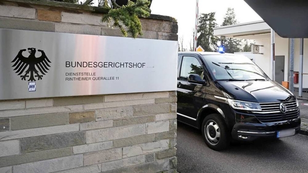 Police vehicles leave the Federal Public Prosecutor’s Office at the Federal Court of Justice in Karlsruhe, Germany. — courtesy Bernd Wei’brod/picture-alliance/dpa/AP