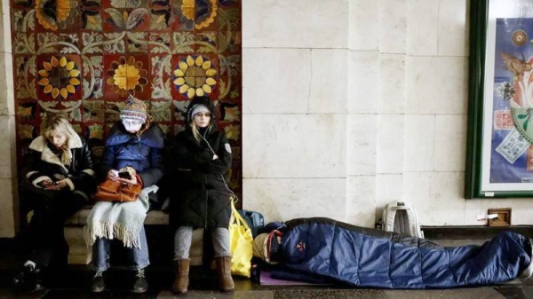 People take shelter in a metro station during a Russian missile strike, amid Russia’s attack on Ukraine, in Kyiv, Ukraine, Sunday. — courtesy Reuters