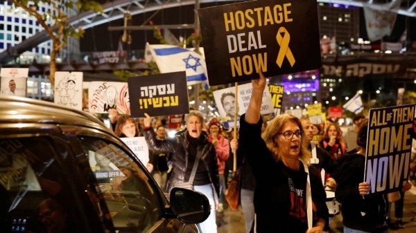 Demonstrators call for the release of Israeli hostages being held by Hamas during a protest in Tel Aviv on March 17, 2024