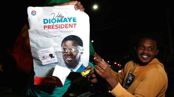 Supporters of Bassirou Diomaye Faye celebrate in Dakar