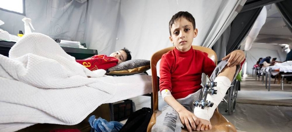 Children are being treated in a temporary field hospital in Mouraj, a neighborhood in the south of the Gaza Strip. — courtesy WHO/Christopher Black