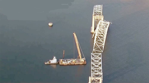 A screengrab shows largest crane on the eastern US seaboard in Baltimore as part of a massive clean-up effort Baltimore bridge collapse.