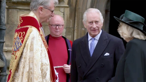 British King Charles, accompanied by Queen Camilla, arrives at Easter service in Windsor.