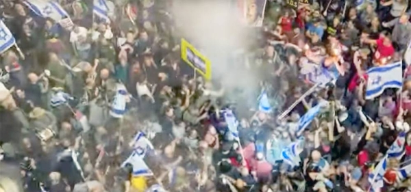 A screengrab shows multitudes of protesters in Tel Aviv rallying for the release of hostages held in Gaza on Saturday.