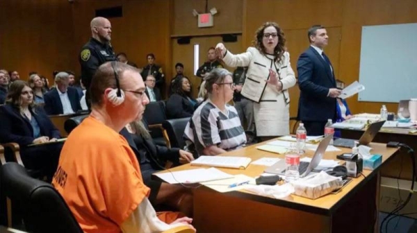 James and Jennifer Crumbley, the parents of a Michigan teenager who shot dead four students, have each been sentenced to 10 to 15 years in prison. — courtesy Getty Images