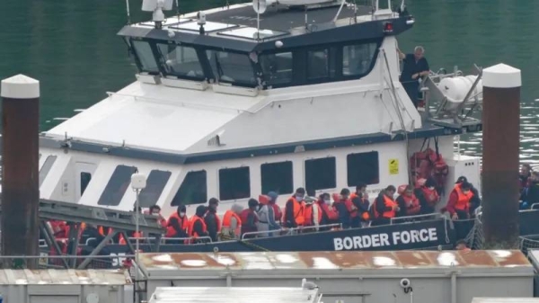 Alleged asylum seekers arrive in the UK on a Border Force boat. — courtesy PA Media