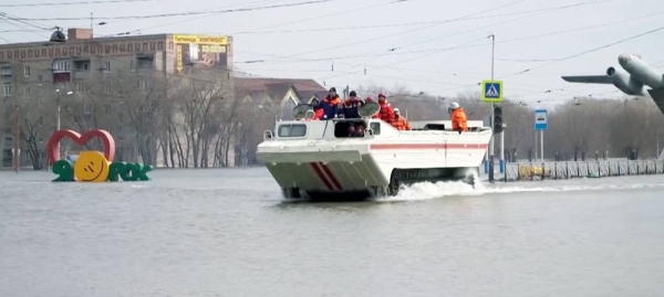 Rescuers scour various areas in many villages, which are now completely flooded, in the region of Orenburg.