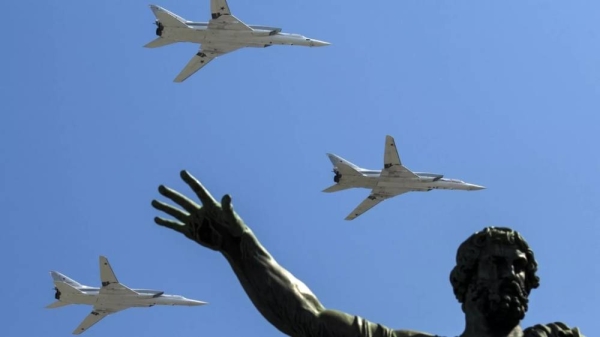 Russian Tu-22M-3 long-range bombers fly during the Victory Day military parade marking 71 years after the victory in WWII in Red Square in Moscow, Russia, 2016