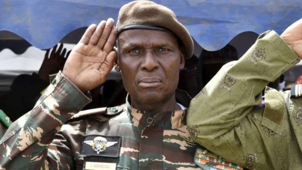 Col. Ibro Amadou, an influential member of the military regime in power in Niger, gives a military salute while attending a demonstration for the immediate departure of United States army soldiers deployed in northern Niger in Niamey. — courtesy AFP