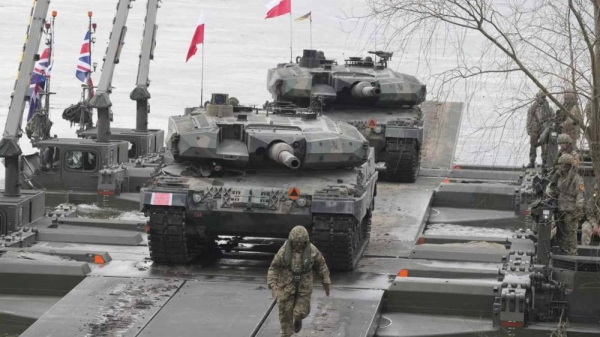 Polish and other NATO troops take part in military maneuvers Steadfast Defender 24 in Korzeniewo, in Poland Monday, March 4, 2024