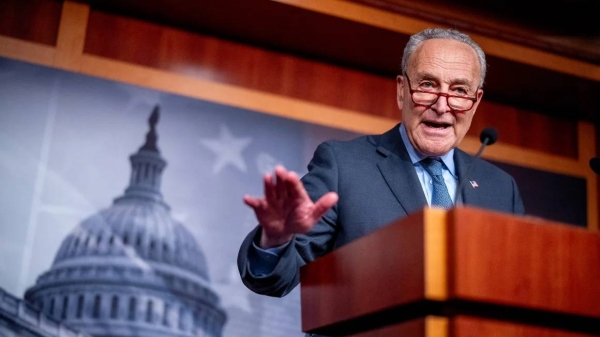 Senate Majority Leader Chuck Schumer speaks to reporters on Capitol Hill on April 17, 2024