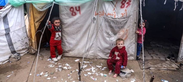 Young children stand outside their temporary shelter in Rafah, in the southern Gaza Strip. (file) — courtesy WHO