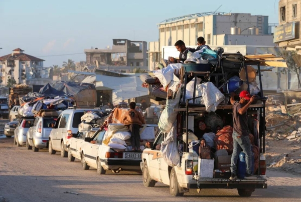 Displaced Palestinians fleeing Rafah after the Israeli military told civilians to leave the eastern parts of the southern Gazan city, May 6, 2024