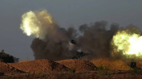 Israeli artillery units fire at an undisclosed target in the Gaza Strip on 7 May 2024