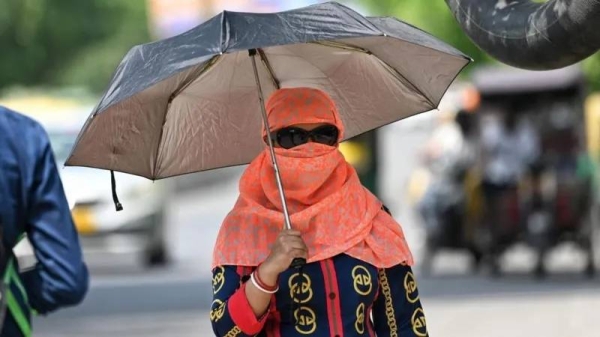 It's common to see Indians using umbrellas to shield from the heat