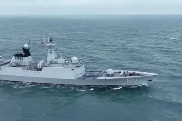 Chinese guided missile frigate Nantong is seen taking part in the military drills