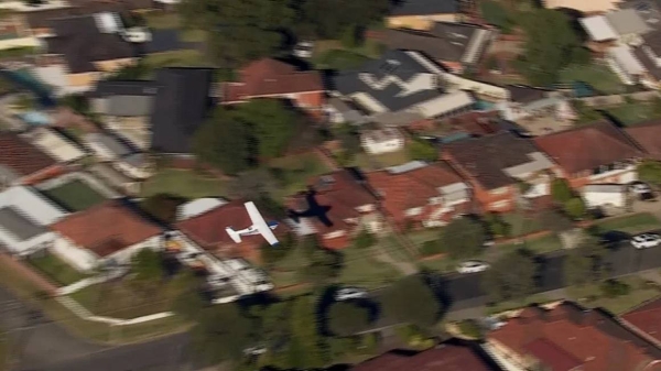 Gliding just feet above suburban homes, two survive emergency small plane landing in Australia on May 26, 2024