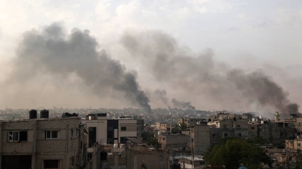 Smoke billows following Israeli strikes in Rafah city in the southern Gaza Strip on Tuesday