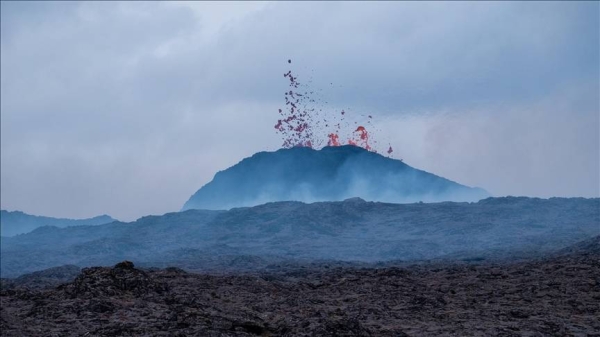 Lava overflows crater in Iceland, forces closure of geothermal resort