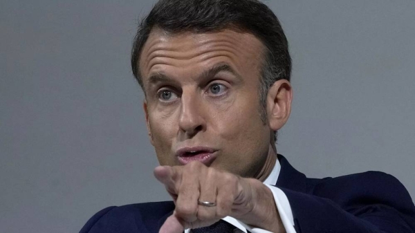 French President Emmanuel Macron delivers a speech in Paris, 12 June 2024