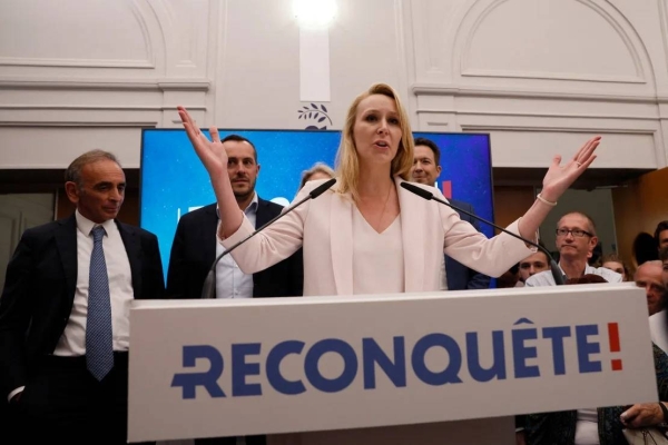 Marion Marechal addresses supporters of her party, Reconquest, alongside party president Eric Zemmour, left, on Sunday. Marechal and Zemmour have since had a falling out