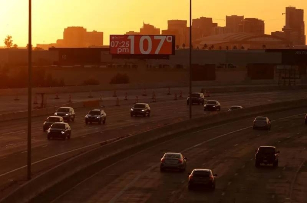 A billboard shows the temperature on 5 June in Phoenix, Arizona