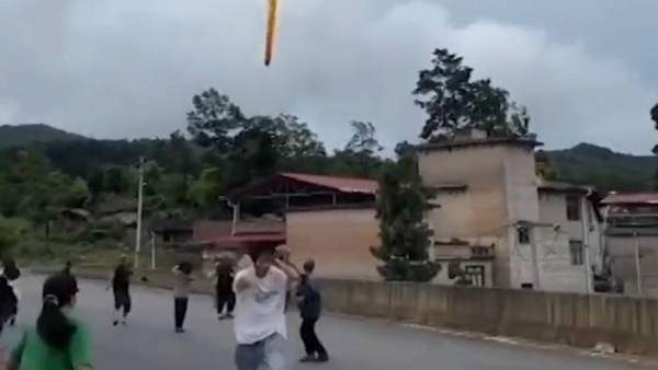 Video posted on social media showed suspected Chinese rocket debris falling over Xianqiao village in Guizhou Province, China, following a launch on June 22, 2024.