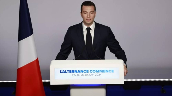 Far-right National Rally party president Jordan Bardella delivers his speech after the first round vote of the legislative election, June 30, 2024 in Paris