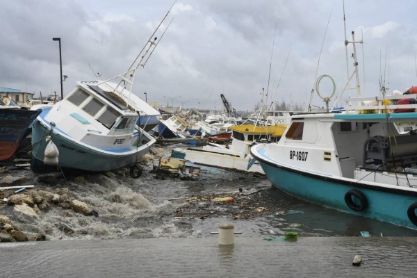 Damaged fishing boats rest on the shore after the passing of Hurricane Beryl at the Bridgetown Fish Market, Bridgetown, Barbados on July 1
