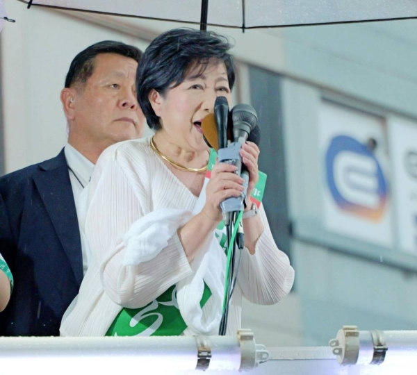 Tokyo’s first female governor set to secure third term in landslide election victory