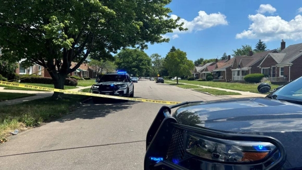 Police block off a portion of Rossini Drive in Detroit after a shooting Sunday, July 7, 2024