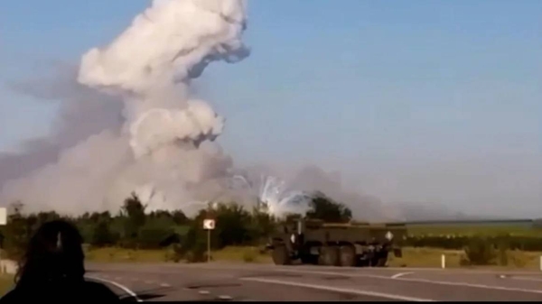 Smoke billows after a Ukrainian drone strike on a warehouse in Russia's southwestern Voronezh region on July 7