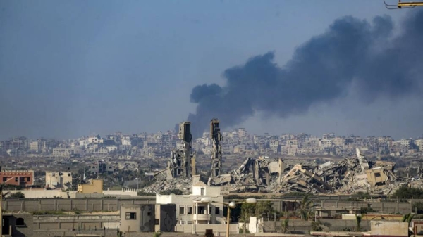 Smoke rises following an Israeli airstrike in the central Gaza Strip