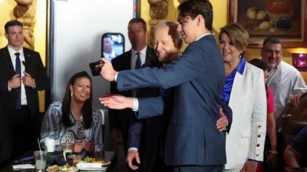President Biden had selfies taken with diners at a Mexican restaurant in Las Vegas