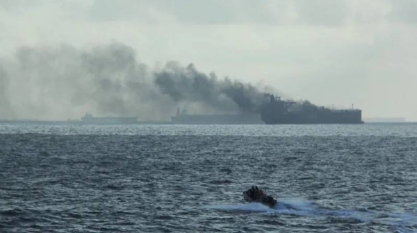 Malaysia's rescue teams reach oil tankers on fire off the country's eastern coast