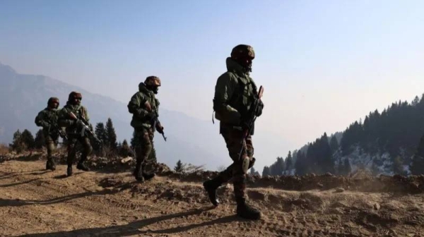 Indian army soldiers patrol the Line of Control, the de facto border with Pakistan